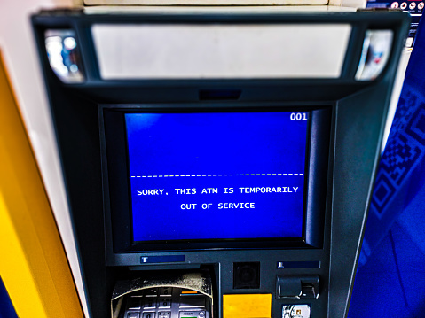 ATM - automated teller machine with a temporarily out of service sign on screen.