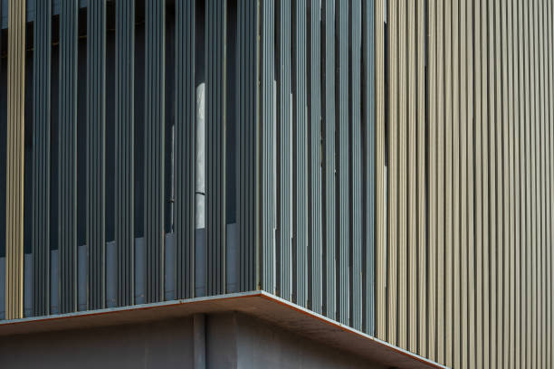 Closeup brand new modern apartment building, background with copy space, full frame vertical composition, Sydney Australia