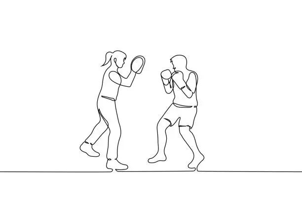 Vector illustration of man boxer training with female trainer - one line drawing vector. boxing training concept, punching