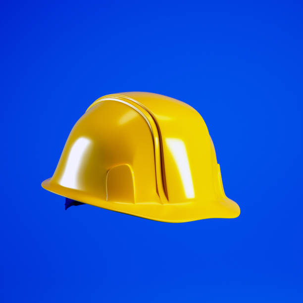 istock Hard hat for Labour Day concept. Yellow helmet isolated on blue background, 3d render 2049898032
