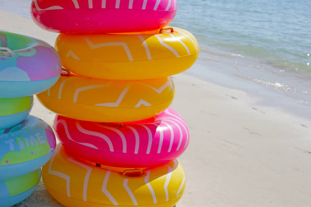 istock Inflatable rings on the beach. Summer concept 2049911144