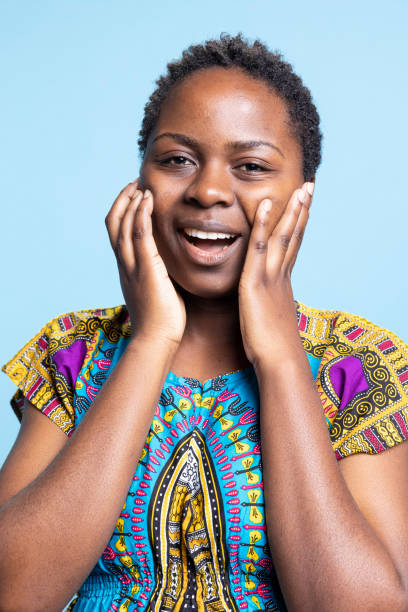 istock Joyful natural beauty laughing and having a good time in studio 2049929406