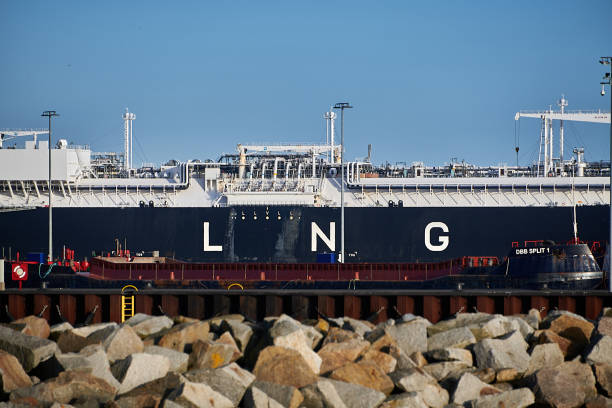 mukran/germany: 02-24-2024 energos power - lng offshore support vessel, imo 9861809 on arrival day in mukran harbor for installing lng supply of germany - harbor editorial industrial ship container ship imagens e fotografias de stock