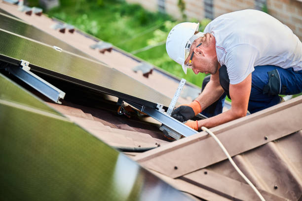 istock Worker building photovoltaic solar panel system, using ruler to measure mounting equipment. 2049933253