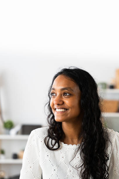 istock Smiling Indian woman with copy space 2049935417