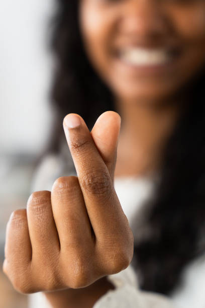 istock Black woman doing love shape 2049935500