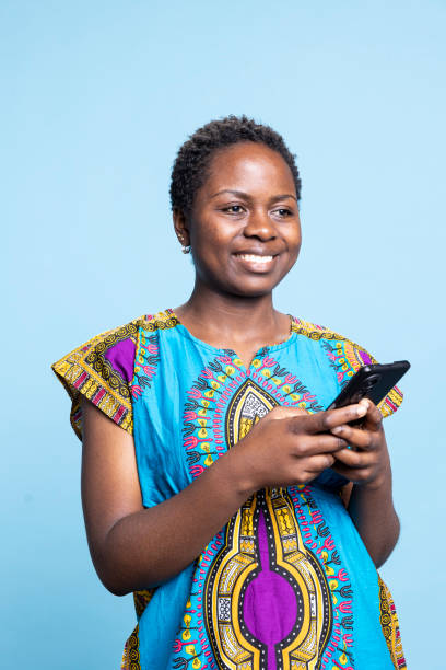 istock African american girl using smartphone application for messaging 2049936550