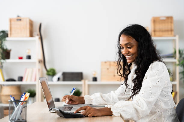 istock Young Indian woman working at home 2049936618