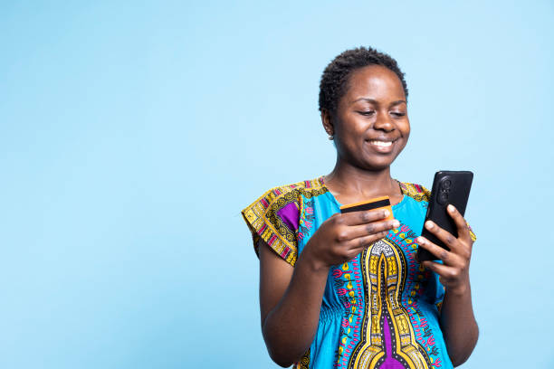 istock African american lady making online payment with credit card 2049939201