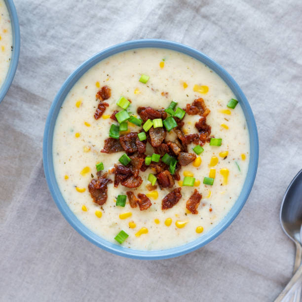 istock Homemade Corn Chowder with Bacon in Bowls, top view. Flat lay, overhead, from above. 2049942367