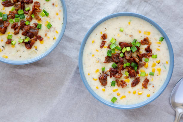 istock Homemade Corn Chowder with Bacon in Bowls, top view. Flat lay, overhead, from above. 2049942738