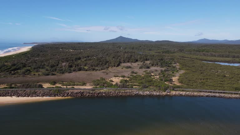 Aerial views of Urunga boardwalk along the beach to Picket Hill and beyond to Nambucca Heads.