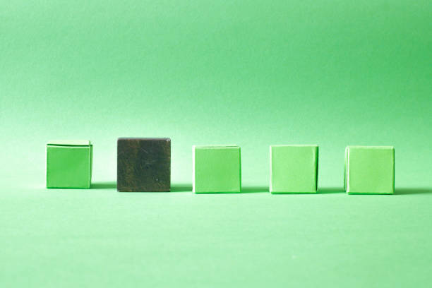 Business & design concept - Abstract geometric real floating wooden dice isolated on background, it's not 3D render. symbol of leadership, teamwork and success