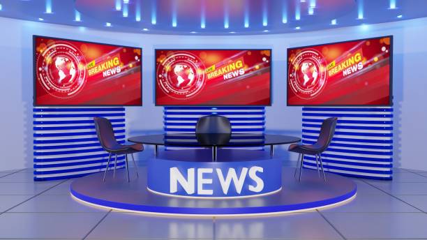 istock glass table and led screen background in a news studio room.3d rendering. 2049974237