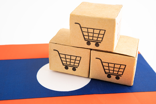 Box with shopping online cart logo and Laos flag, Import Export Shopping online or commerce finance delivery service store product trade, supplier.