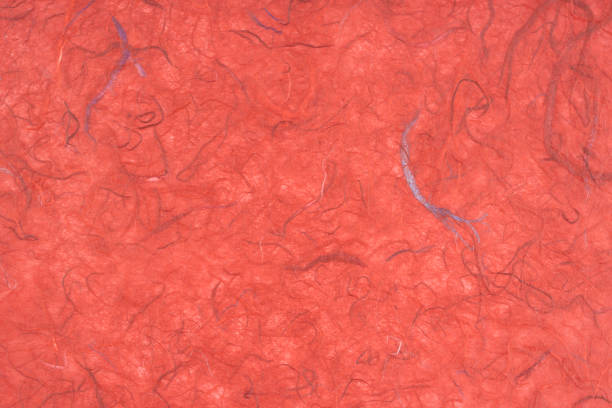 orange and red vein - background and texture of handmade Nepalese batik lokta paper