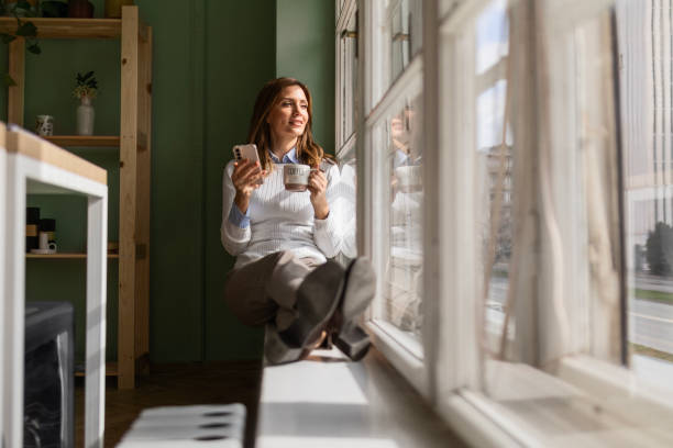 istock Businesswoman Finding Peace by the Window 2050049062