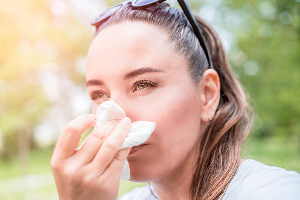 istock Young woman suffering from allergy outdoors. Pollen allergy symptoms 2050122776