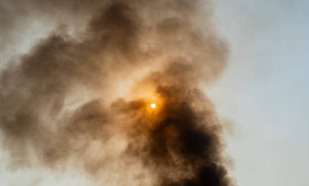 istock Smoke from burning garbage is rising into the atmosphere.  causing pm.5 global warming 2050131752