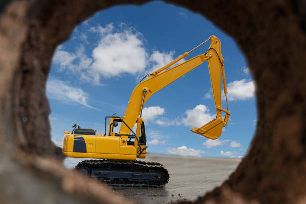 istock Excavator are digging the soil in the tunnel construction site. 2050133327