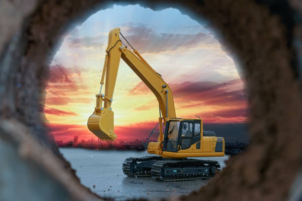 istock Crawler excavator are digging soil in the tunnel construction site. 2050133329