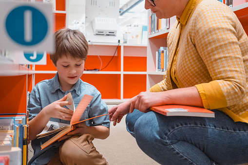 Mother and son at the public library