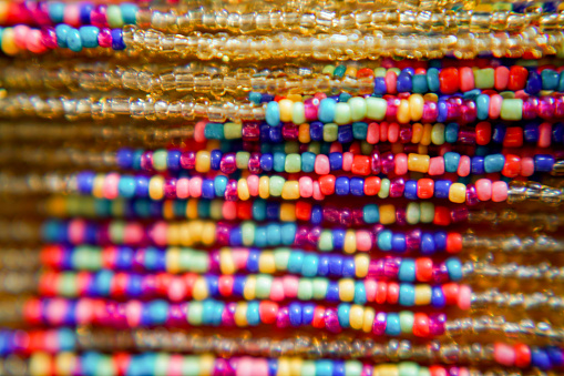 Colorful beads as a background. Close up.