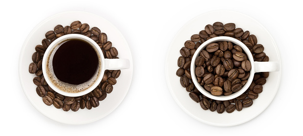 two cups with coffee and coffee beans