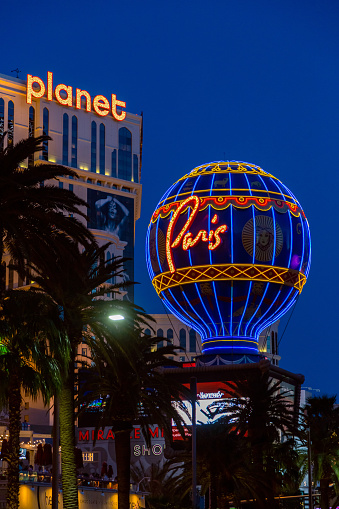 Las Vegas, Nevada - April 2017: Paris sign in Las Vegas. Scenic view of the casinos and resorts. Night view Las Vegas Blvd circa. Nightlife on Las Vegas Strip Boulevard.