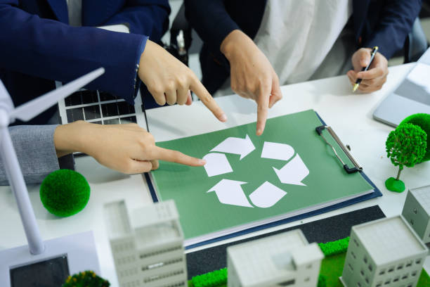 istock Businessman working virtual modern computer to reduce CO2 emissions carbon footprint climate change to limit global warming.Sustainable development and innovation green business concept. 2050259783