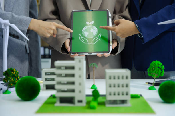 istock Businessman working virtual modern computer to reduce CO2 emissions carbon footprint climate change to limit global warming.Sustainable development and innovation green business concept. 2050260296