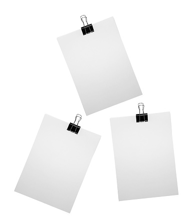 papers and bulldog clip isolated on white