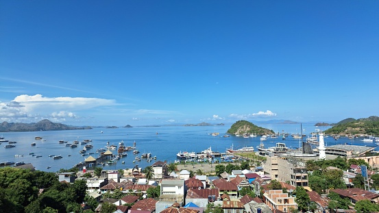 Labuan Bajo, Indonesia - February 29 2024 : view of the atmosphere of Labuan Bajo during the day. photo taken from the top of Waringin.