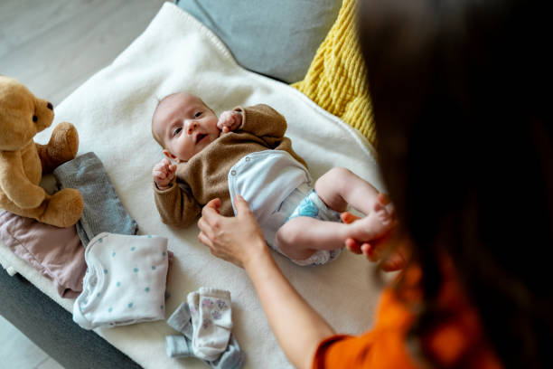 istock Bonding with baby happens anytime even during a diaper change 2050356621