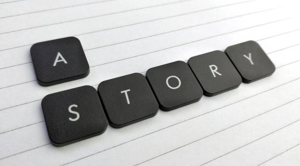 istock story text written with black block on wooden cubes 2050374136