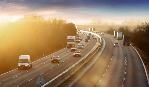 istock Traffic on the move at sunset, Transportation in highway 2050410873