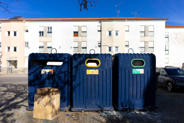istock Recycling bins in a city. 2050416075