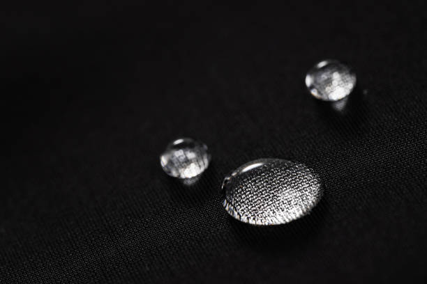 istock Water drops on waterproof black fabric 2050424541