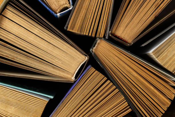 istock Old and used hardback books or textbooks 2050432568