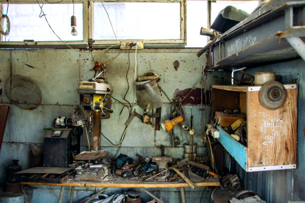 istock Old tools on dusty wooden table in pottery workshop. Creative studio of homemade earthenware 2050433099