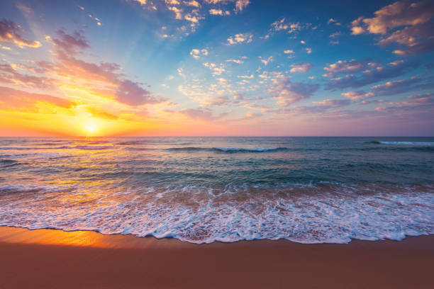istock Beautiful cloudscape over the sea waves and tropical beach shore 2050447456