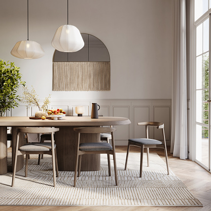 Stylish composition of elegant dining room interior design with velvet armchairs, design rounded wooden table and beautiful personal accessories. Glamour interior design inspiration. Template.