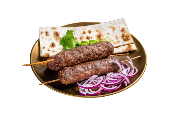 istock Lamb meat kofta kebab, onion and flat bread on plate.  Isolated on white background. Top view. 2050464298