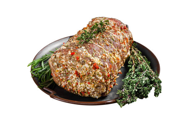 istock Rolled meat pork roulade with rosemary and thyme.  Isolated on white background. Top view. 2050464335