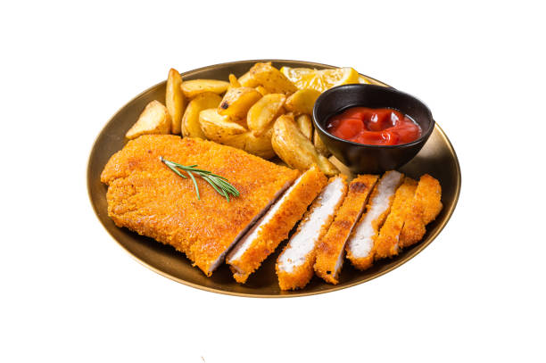 breaded german weiner schnitzel with potato wedges.  isolated on white background. top view. - weiner schnitzel imagens e fotografias de stock