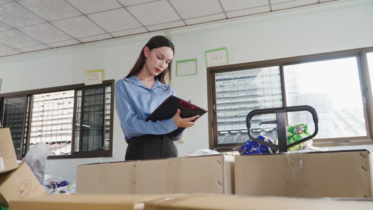 factory concept, transgender secretary checking goods and machinery