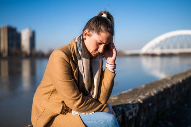 istock Worried woman having headache 2050514103