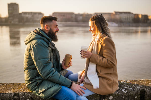 istock Couple drinking coffee outdoor 2050514688