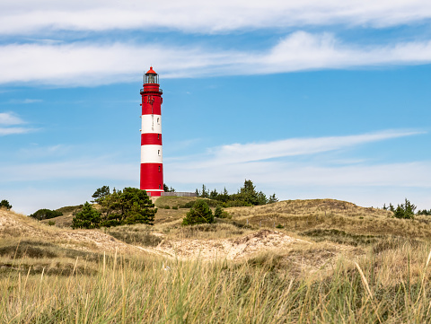 Lighthouse in dunes near Nebel on Amrum island, North Frisia, Schleswig-Holstein, Germany