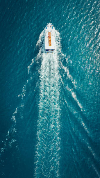 Cruise Ship Making Waves in Vast Blue Ocean